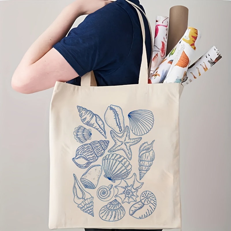 Canvas Tote Bag - กระเป๋าผ้าแคนวาสลายปลาดาวและเปลือกหอย ปี 2026 สำหรับผู้หญิง กระเป๋าสะพายสไตล์เรโทรลายสัตว์ทะเล ของขวัญสำหรับคนรักทะเล